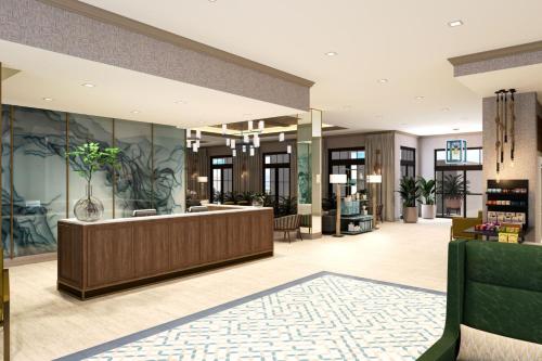 a lobby of a hotel with a reception desk at Hotel Indigo - Panama City Marina by IHG in Panama City