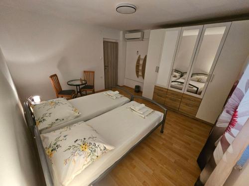 Cama ou camas em um quarto em Apartma RELAX