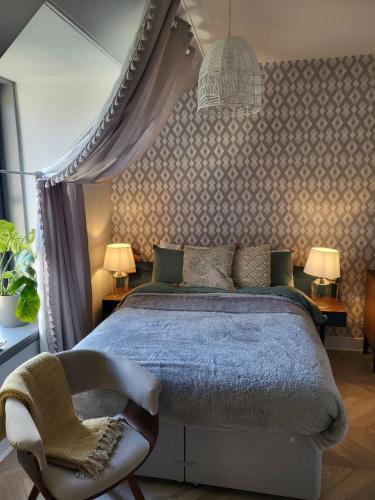 Ένα ή περισσότερα κρεβάτια σε δωμάτιο στο Trinity apartments n56