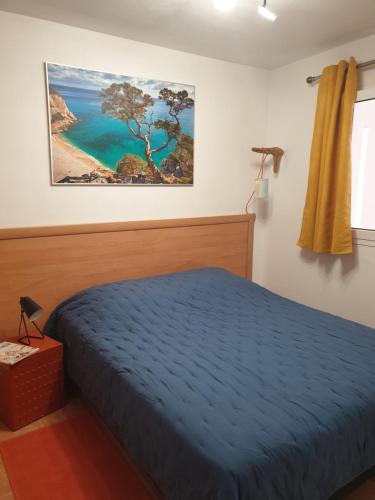 Ένα ή περισσότερα κρεβάτια σε δωμάτιο στο Appt dans résidence avec piscines et plage privées
