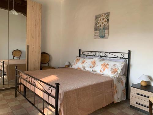 Ένα ή περισσότερα κρεβάτια σε δωμάτιο στο Casa Floridea