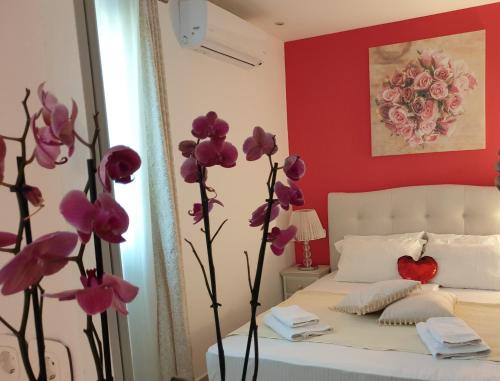 Postel nebo postele na pokoji v ubytování Aloe house Lakithra