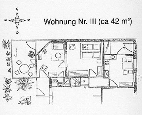 einen schwarz-weißen Grundriss eines Hauses in der Unterkunft Friesenhaus, App. 3 in Westerland