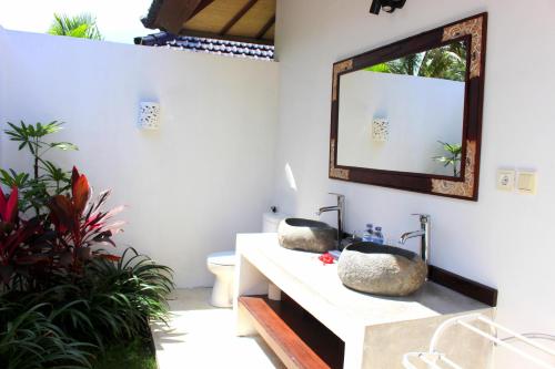 Ванна кімната в Uma Kama Villa