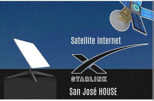 a sign for a satellite initiative internet and a laptop at San José HOUSE in Leticia