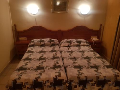  Hotel Sucara -  Room  picture :   Bath    TV    Telephone                           