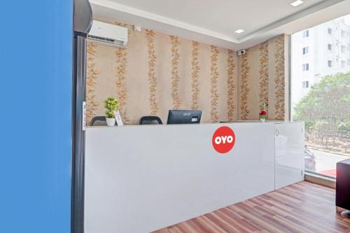 an office with a no sign on a reception desk at OYO Flagship Luxury Rooms in Hyderabad
