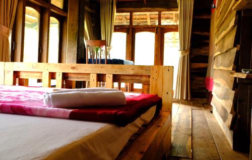 Postel nebo postele na pokoji v ubytování Plei Homestay & Café