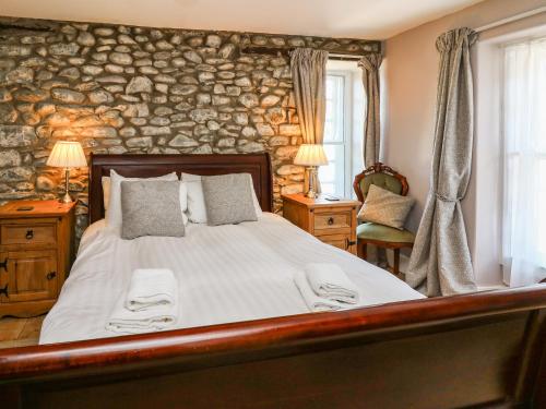 Ένα ή περισσότερα κρεβάτια σε δωμάτιο στο Dewi Villa