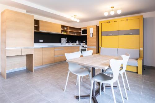 Η κουζίνα ή μικρή κουζίνα στο hôtel résidence a torra