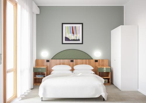 Ένα ή περισσότερα κρεβάτια σε δωμάτιο στο Brora Family Village