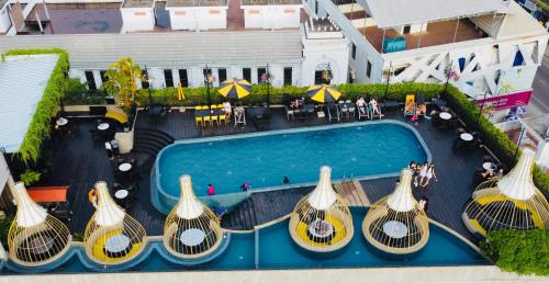 an overhead view of a pool at a hotel at The Twizt - Lifestyle Hostel & Hotel in Siem Reap