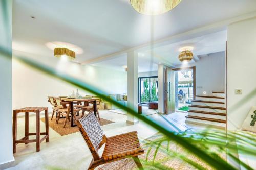 a view of the dining room and living room of a house at Villa Bali Cocoon - Piscine - luxe - 4 or 5 Px in Agadir