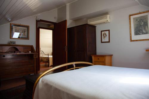 Postel nebo postele na pokoji v ubytování MAGIA & EMOZIONI - Trecastagni- Falde ETNA Villa vista mare