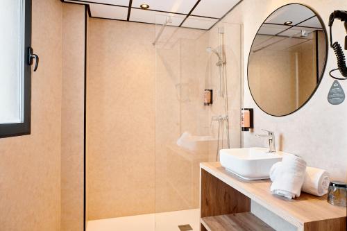 a bathroom with a sink and a shower at tent Torremolinos in Torremolinos