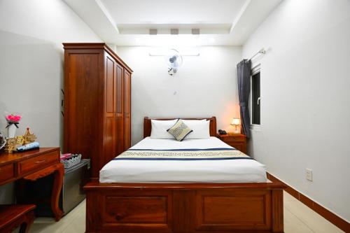 Postel nebo postele na pokoji v ubytování Sky Star Hotel