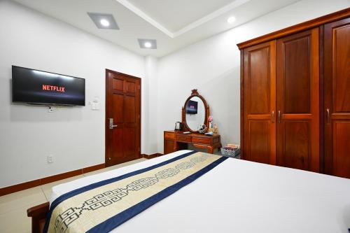 Postel nebo postele na pokoji v ubytování Sky Star Hotel
