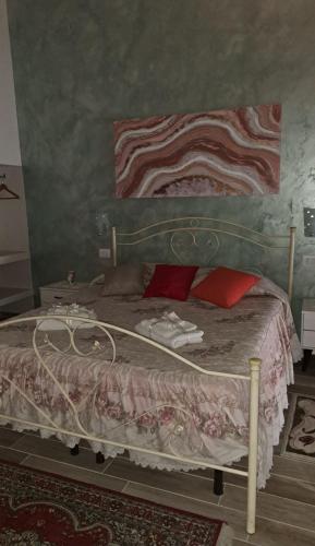 Una cama o camas en una habitación de Sabbia del Sud Affittacamere
