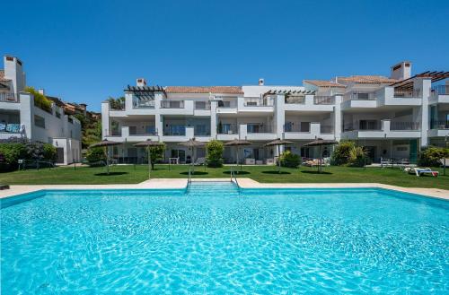 Πισίνα στο ή κοντά στο Garten Appartment in La Floresta - La Mairena