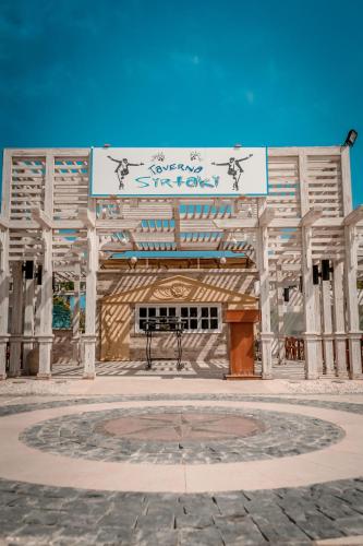 a building with a sign that reads sovereign synergy skate park at Labranda Royal Makadi in Hurghada