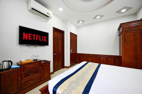 TV a/nebo společenská místnost v ubytování Sky Star Hotel