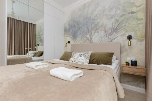 Posteľ alebo postele v izbe v ubytovaní Pozytywny Mokotów Apartment with Balcony Warsaw by Noclegi Renters