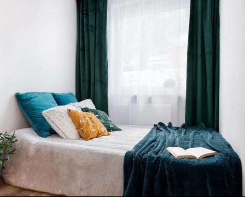 Postel nebo postele na pokoji v ubytování Sun and Sea Apartment Sopot