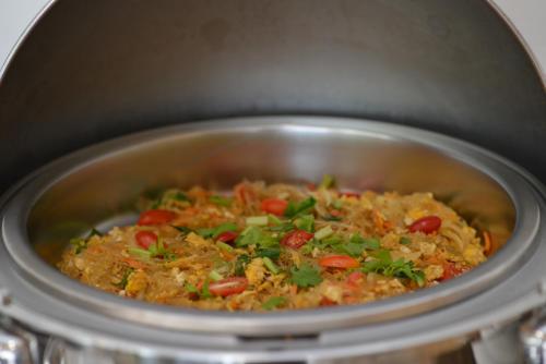 a pot full of food with vegetables in it at VST Residence -SHA PLUS Certified in Ban Khlong Bang Ping