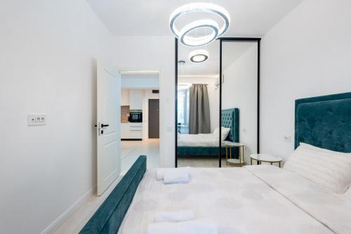 מיטה או מיטות בחדר ב-ViaPipera apartments I Pipera blvd