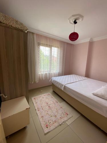 Ένα ή περισσότερα κρεβάτια σε δωμάτιο στο Lapina Suite & Restaurant