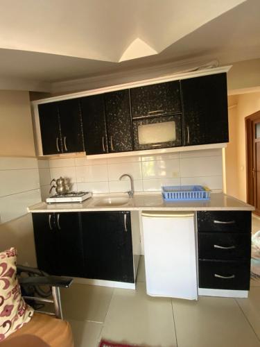 Η κουζίνα ή μικρή κουζίνα στο Lapina Suite & Restaurant