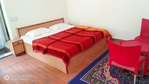 Voodi või voodid majutusasutuse Paradise Hills Dalhousie Panchpula toas