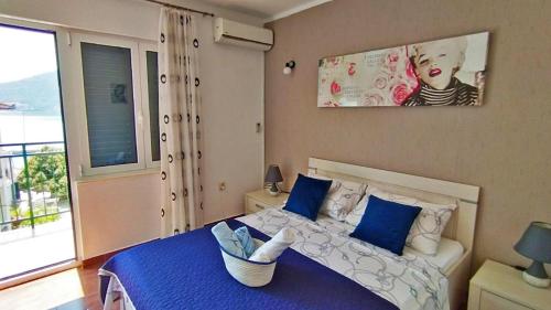 Postel nebo postele na pokoji v ubytování Apartments Aleksandra