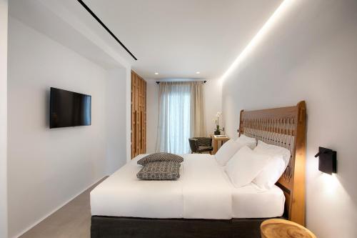 Ένα ή περισσότερα κρεβάτια σε δωμάτιο στο Villa Chanel by Blanco Villas