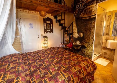 una camera con un letto di B&B Belcuore a Macerata