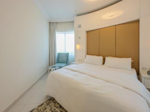 Postel nebo postele na pokoji v ubytování Full Burj Khalifa View- Furnished 1Bedroom Downtown