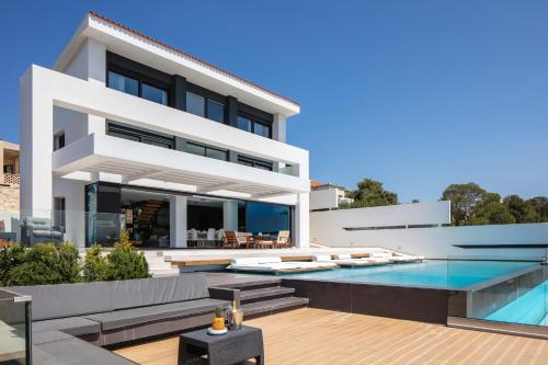 a modern house with a swimming pool at Regal Residence in Chania Town