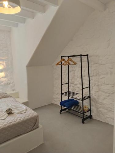Krevet ili kreveti u jedinici u okviru objekta Oniropagida Nisyros apartment #1