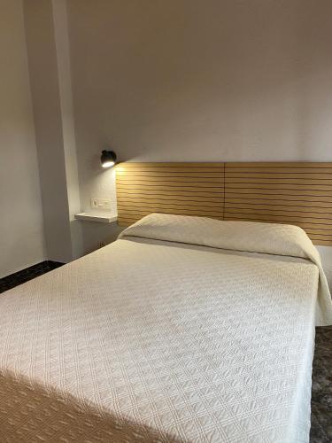 Postel nebo postele na pokoji v ubytování Hotel Rural Cal Amadeu