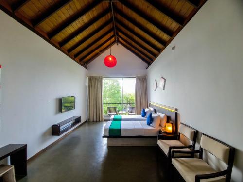 Postel nebo postele na pokoji v ubytování Zen Koggala by Sugar Coliving
