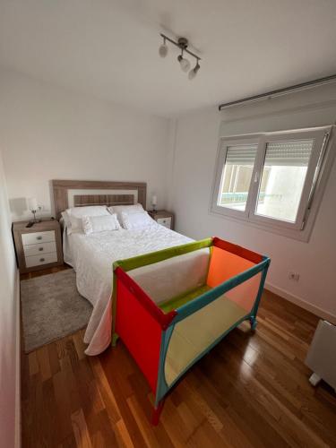 Posteľ alebo postele v izbe v ubytovaní Apartamento Arousa Mar