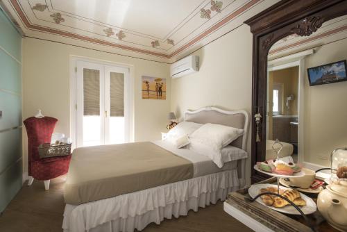 A bed or beds in a room at Pane Amore e Marmellata