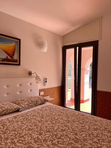 Letto o letti in una camera di Terramata Resort Case Vacanza