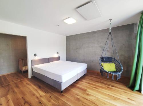 Voodi või voodid majutusasutuse Erdhaus WEST - Ferienhof Bartel toas