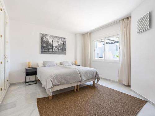 Postel nebo postele na pokoji v ubytování Los Naranjos Beautiful 1 Bedroom penthouse