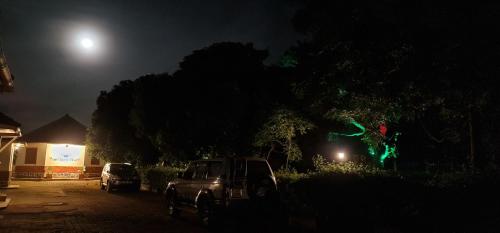 a car parked in a parking lot at night at Northern Pearl in Gulu