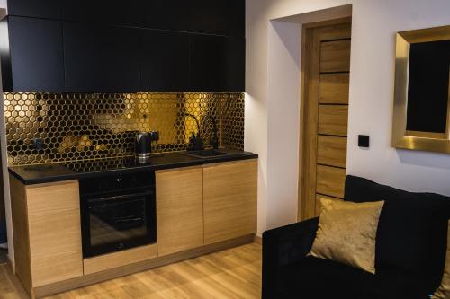 Kuchyňa alebo kuchynka v ubytovaní Apartament 88