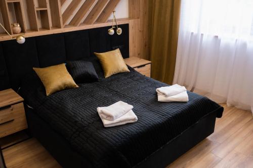 Posteľ alebo postele v izbe v ubytovaní Apartament 88