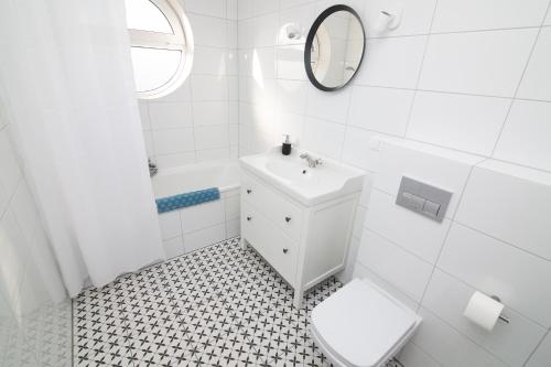 Kúpeľňa v ubytovaní Apartamenty 4YOU Hel