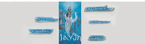 two banners with a mermaid on a wall at Ianthi Boutique Guesthouses Skyros in Skiros
